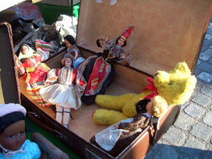 Antique dolls for sale at the Sunday Ljubljana Flea Market