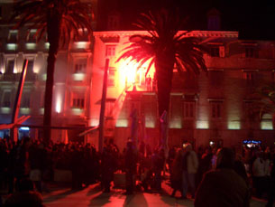 A giant flare lit on a Riva-front balcony during New Year's Eve